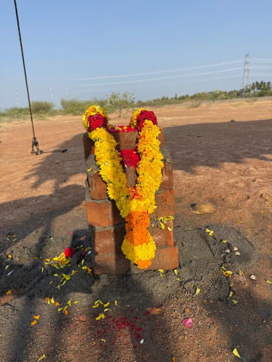 The garlanded foundation pillar, where Factory A begins